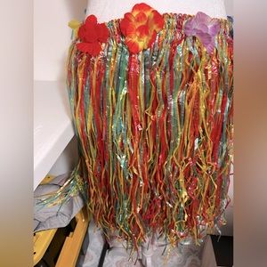 Costume Hawaiian grass, colorful skirt, head flowers, wrist, flowers, and a lei